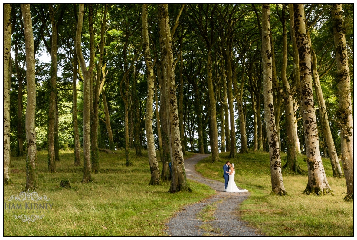 Sarah And Torin in the woods of Glasson Country House Hotel Wedding